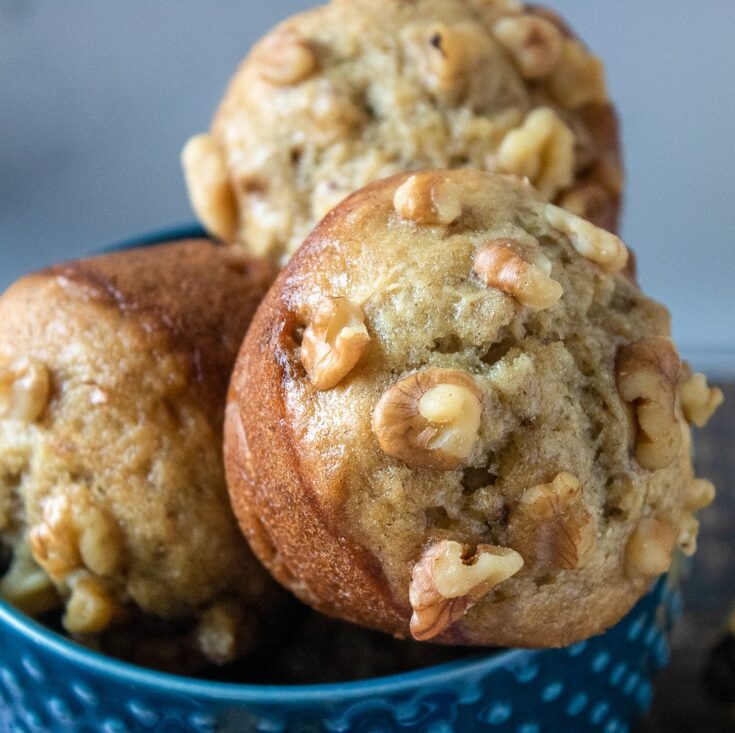 banana nut muffins in a blue bowl