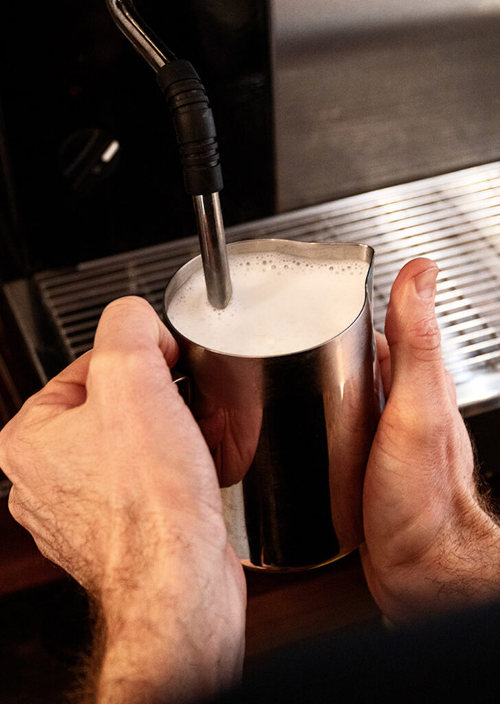 milk steaming in a coffee mug