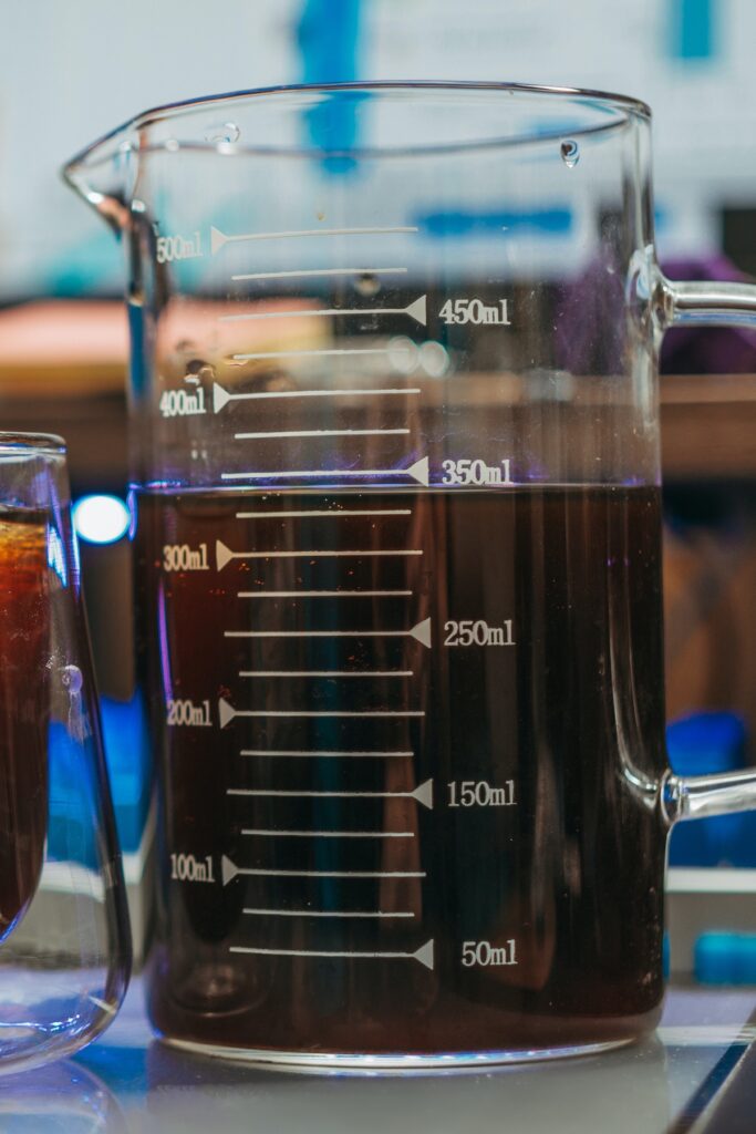 measuring beaker with coffee