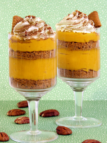 Two glasses of layered creamy pumpkin mousse from a Flavor Portal recipe