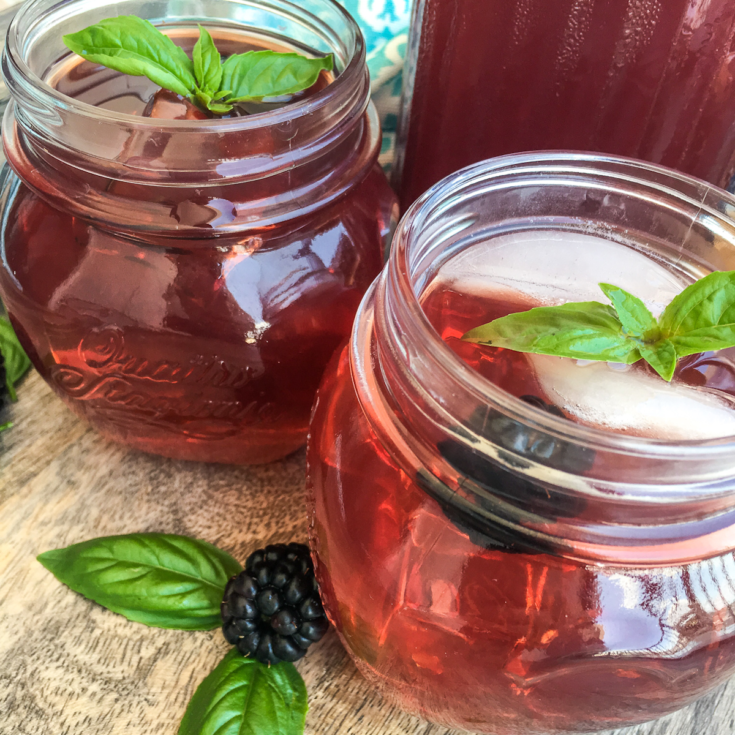 closeup of Instant Pot blackberry iced tea from Flavor Portal recipe in mason jar glasses