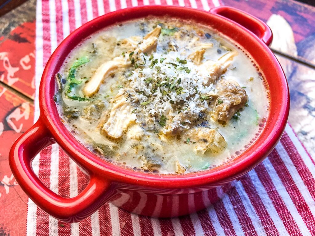 Instant Pot Chicken Florentine Soup from Flavor Portal recipe in a red ceramic bowl