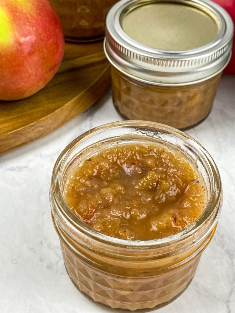 Savory apple chutney in little jars on a table for flavor portal