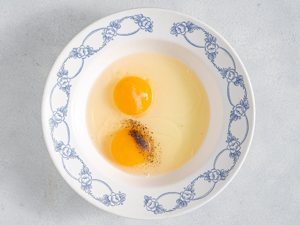 Lemon Panko Fried Shrimp eggs and seasoning in a bowl