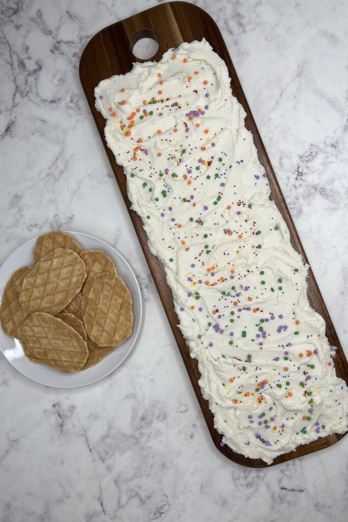 Buttercream frosting board and platter of waffle cookies