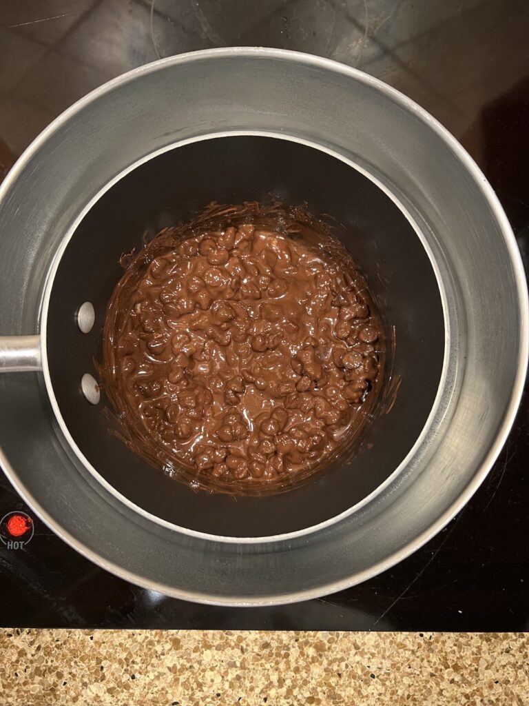 melting chocolate chips in a pot
