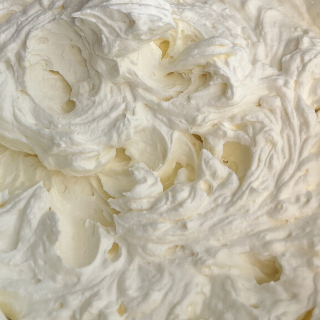 heavy cream whipped until the peaks hold their shape