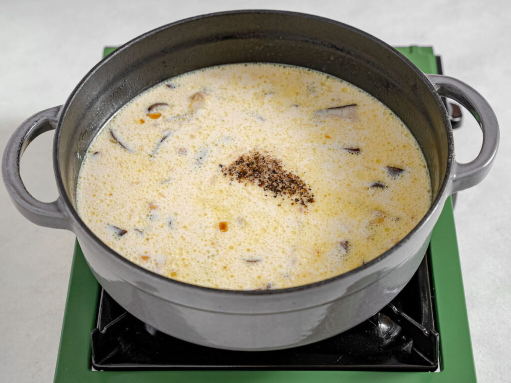 creamy hearty winter soup from Flavor Portal with spices simmering in a pot