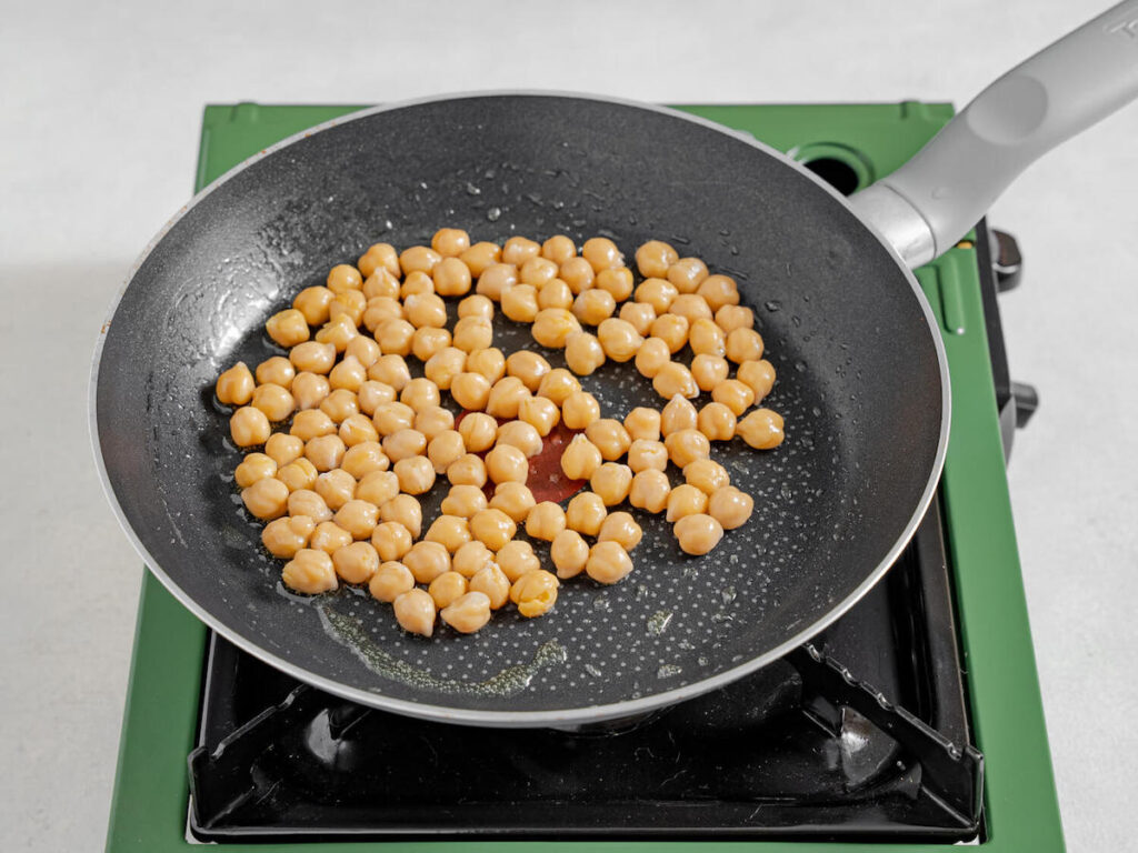chickpeas on a skillet for Flavor Portal hearty winter soup recipe