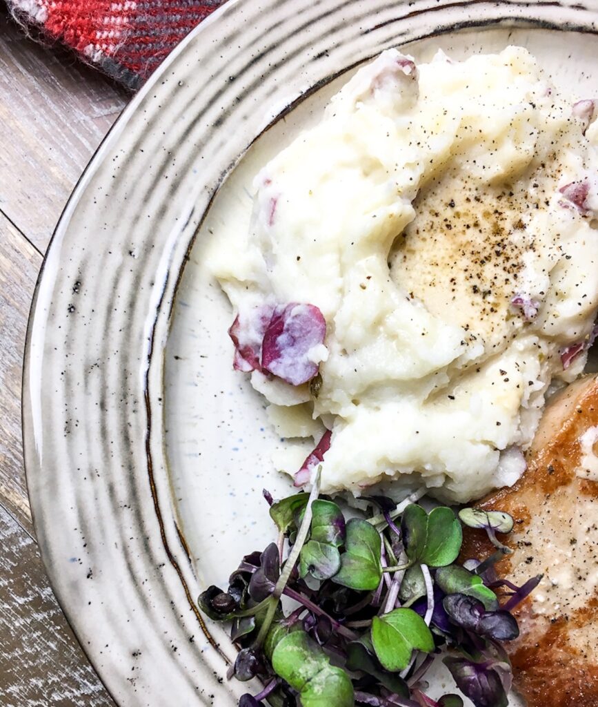 Instant Pot creamy mashed potatoes from Flavor Portal recipe with chicken and microgreens