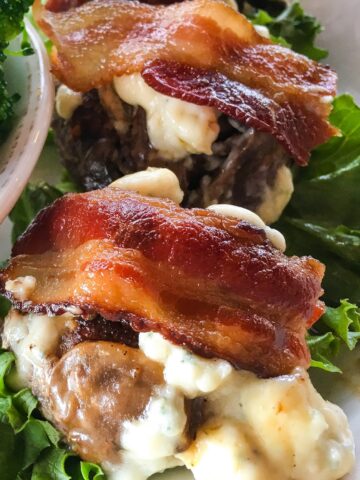 closeup keto blue cheese mini sliders from Flavor Portal recipe on a bed of lettuce