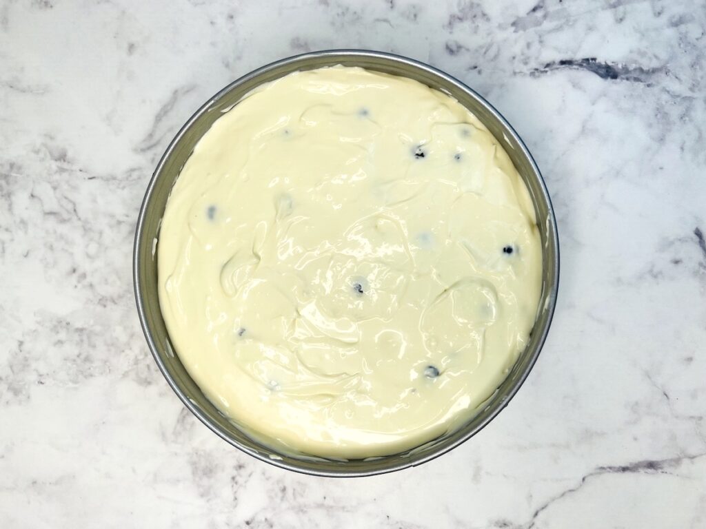 keto blueberry jamboree cheesecake filling smoothed in springform pan