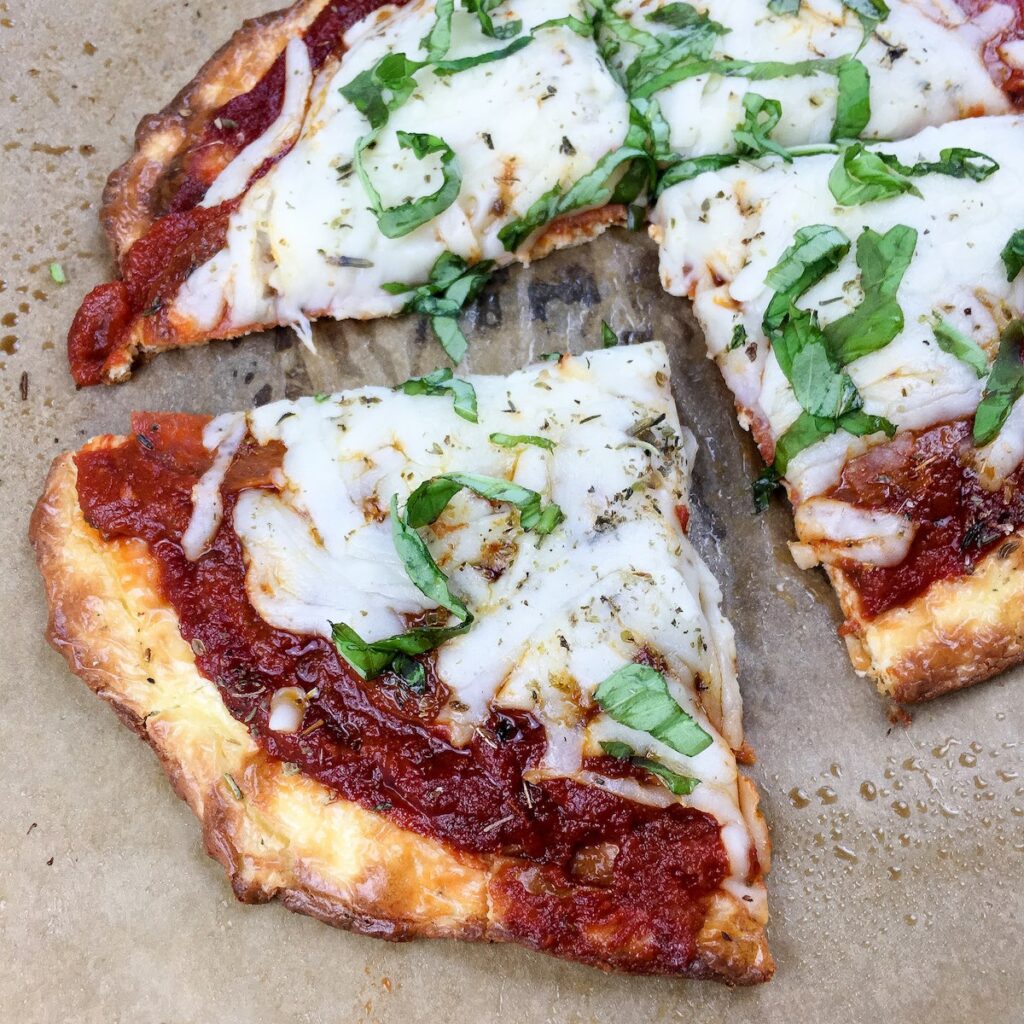 top view baked sliced keto pizza from Flavor Portal recipe