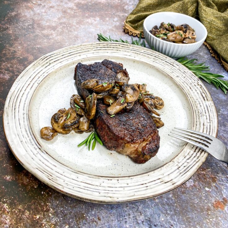 keto strip steak from Flavor Portal recipe topped with sauteed mushrooms