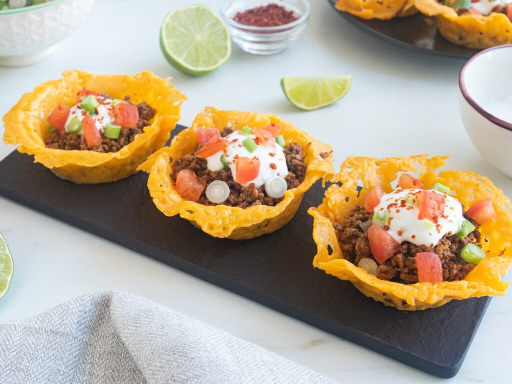 keto taco crisps from Flavor Portal recipe with lime wedge and chili powder
