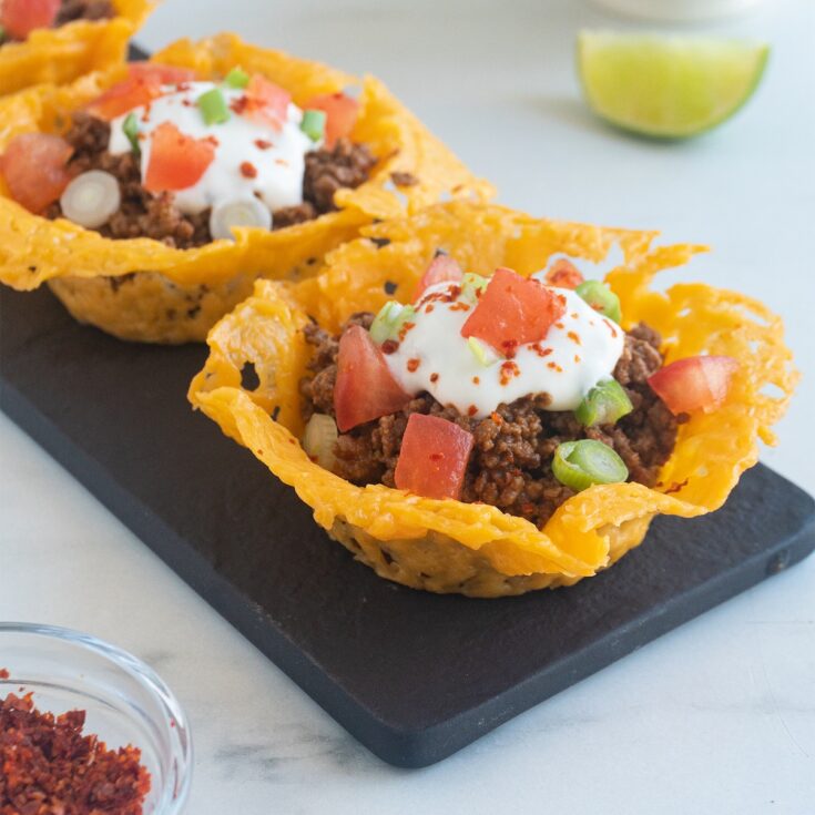 keto taco crisps from Flavor Portal recipe with lime wedge and chili powder