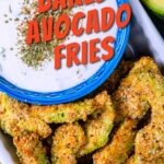 Keto baked avocado fries from Flavor Portal recipe on a white platter and creamy dipping sauce in a blue bowl