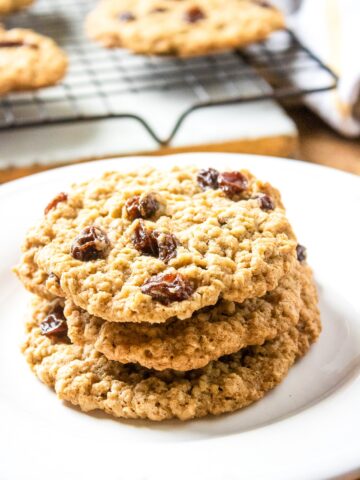 classic oatmeal raisin cookies from Flavor Portal recipe stacked on a white plate