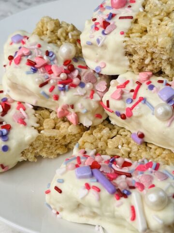 Valentine rice krispie treats from Flavor Portal recipe stacked on a white plate