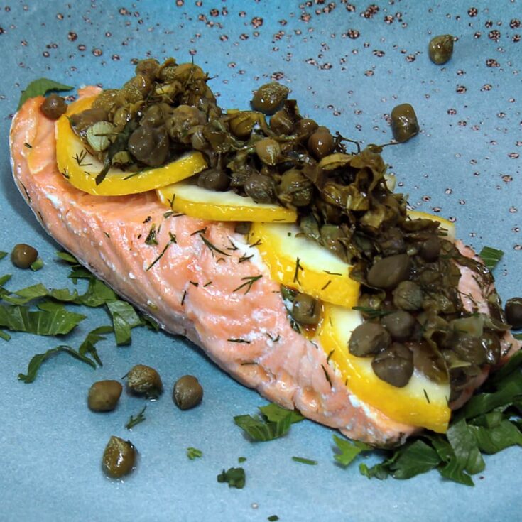 salmon en papilotte from Flavor Portal recipe on a blue plate