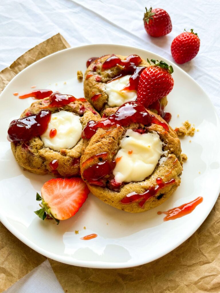 strawberry cheesecake cookies from Flavor Portal recipe on a plate with fresh strawberries