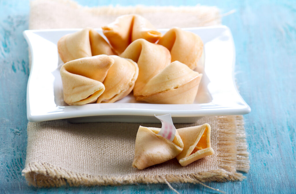 fortune cookies on a square white plate